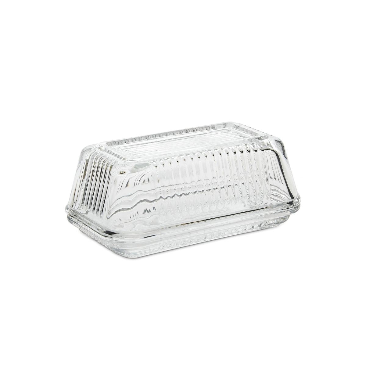 Mantequillera de vidrio transparente con tapa acanalada.